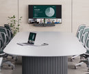 Modern conference room with a Logitech video conferencing system and BYOD setup, enhancing hybrid meetings with seamless USB and HDMI connectivity.